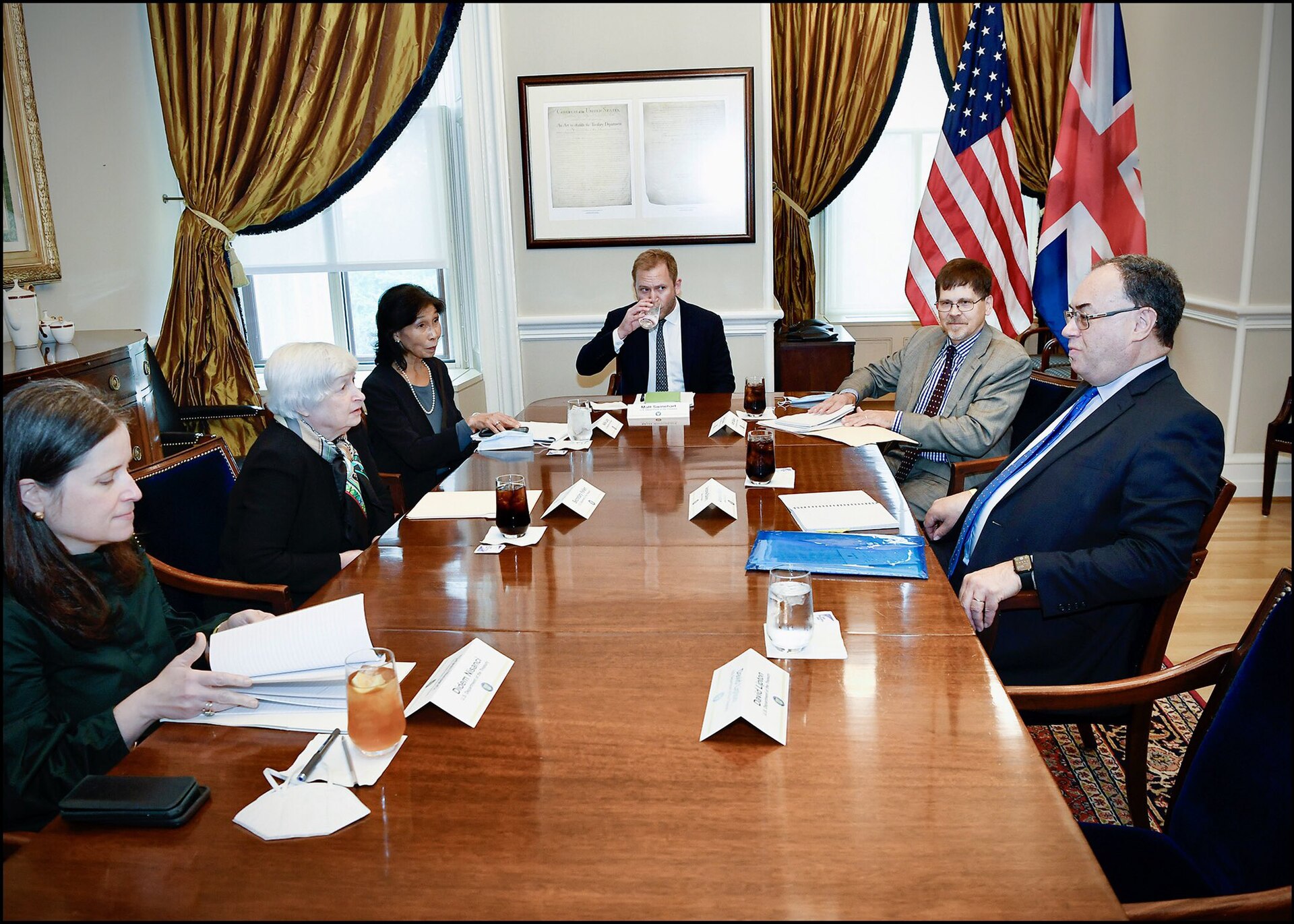 Bank of England governor Andrew Bailey seated at a meeting with US Treasury officials during the 2021 IMF autumn meetings